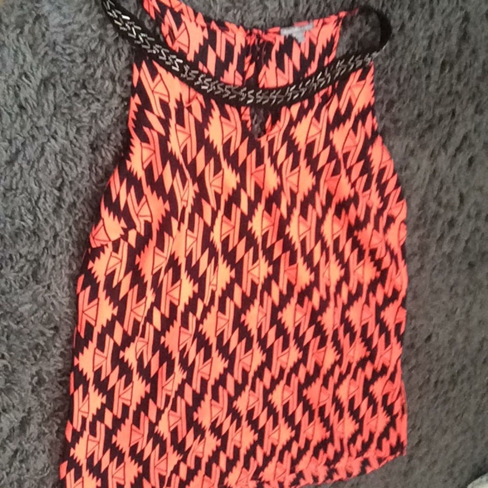 Neon pinkish orange and black shirt,XS in women’s